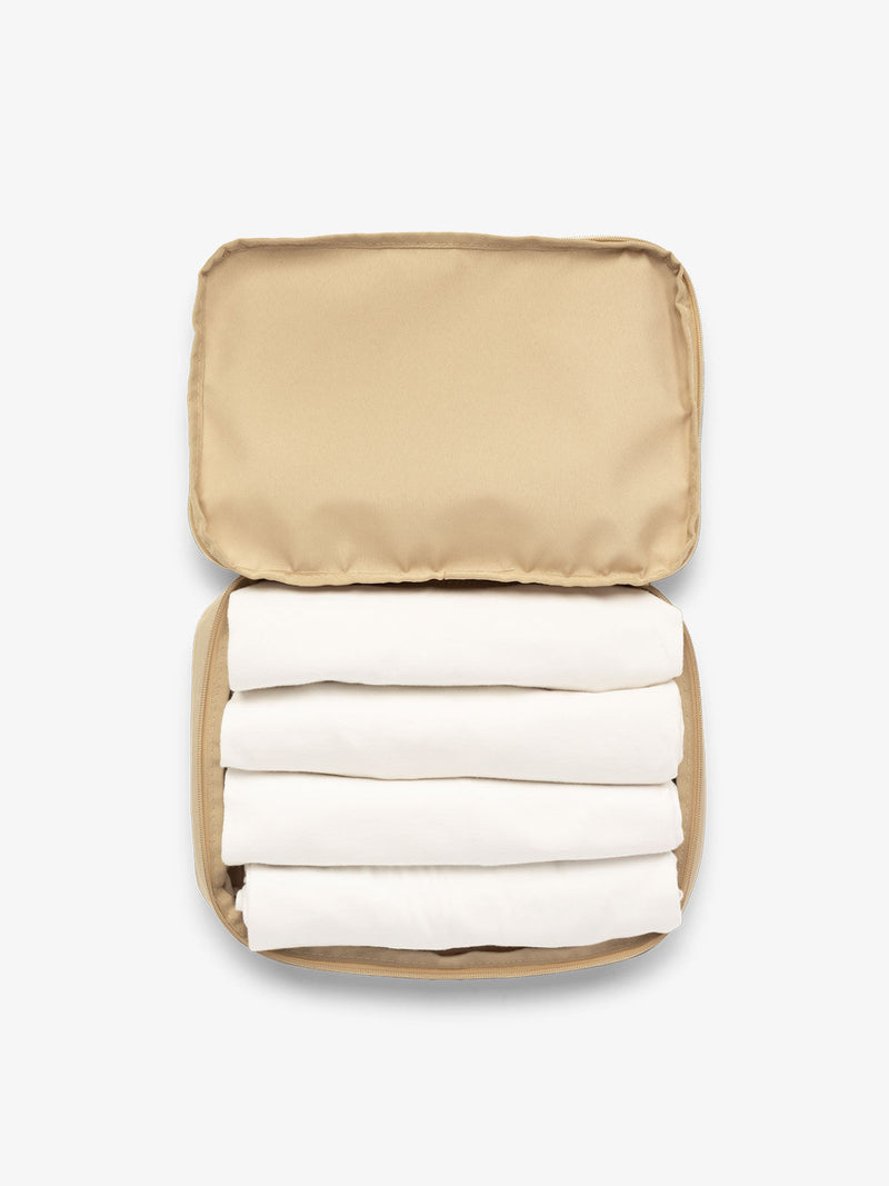 CALPAK packing cubes for travel in beige oatmeal