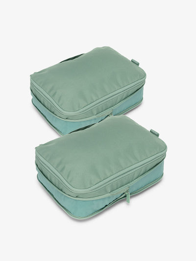 CALPAK compression packing cubes with top handles in sage