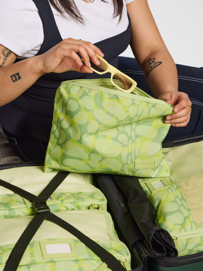 CALPAK 5 piece set packing cubes for travel with labels and top handles in lime green print; PC1601-LIME-VIPER view 2