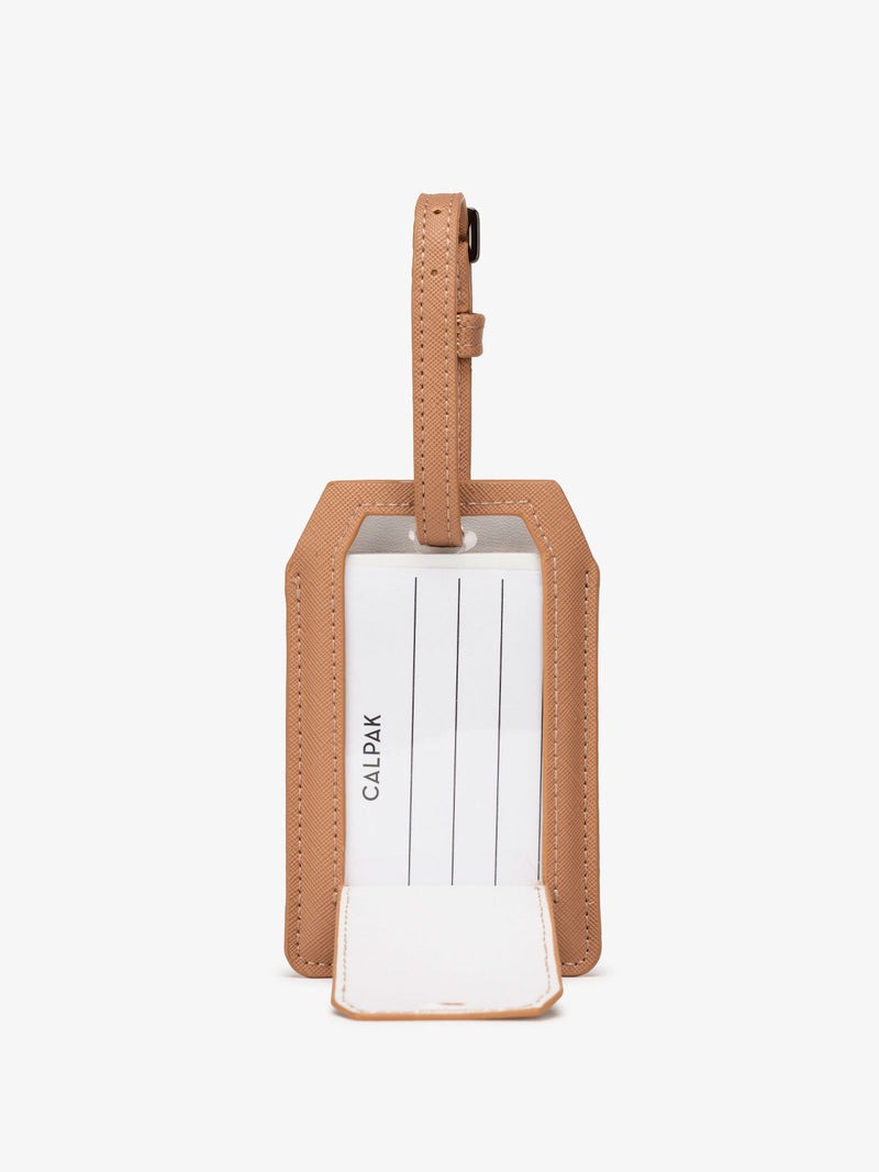 CALPAK Luggage Tag + Charger with removable label for personal info in caramel brown