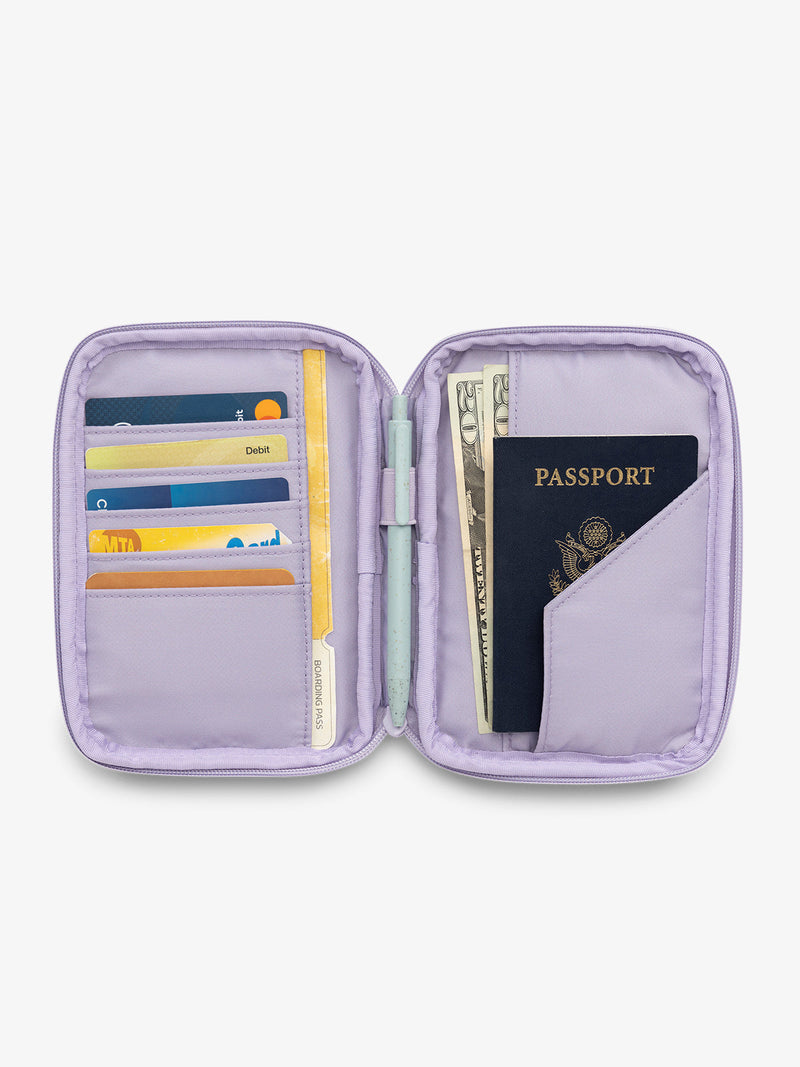 CALPAK Luka Passport Zippered Wallet opened and interior view in lavender purple Orchid