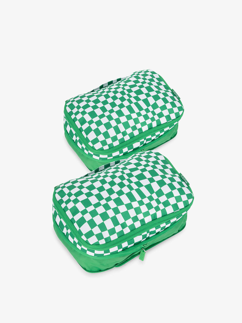 CALPAK small compression packing cubes with top handles and expandable by 4.5 inches in green checkered print