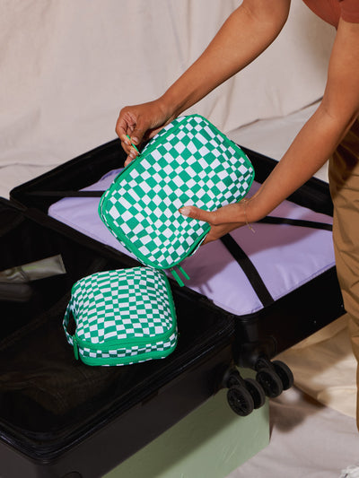 CALPAK small compression packing cubes in green and white checker print; PCS2301-GREEN-CHECKERBOARD view 2