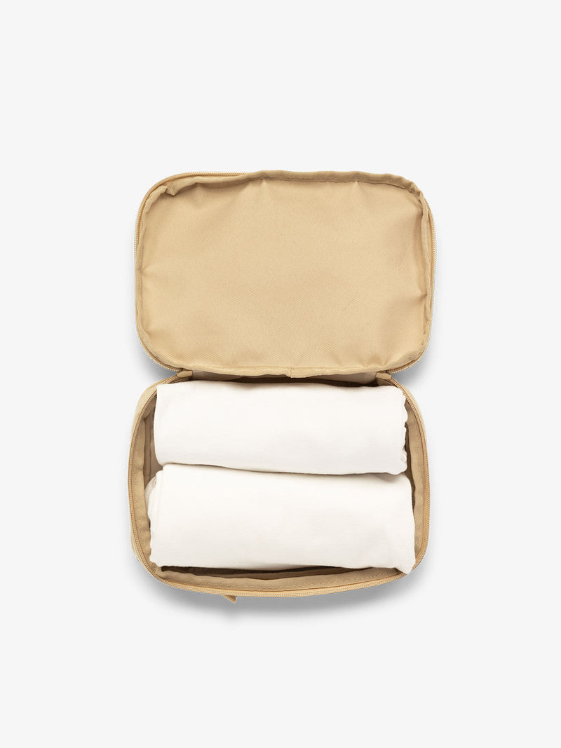 CALPAK small packing cubes for travel made with durable material in beige