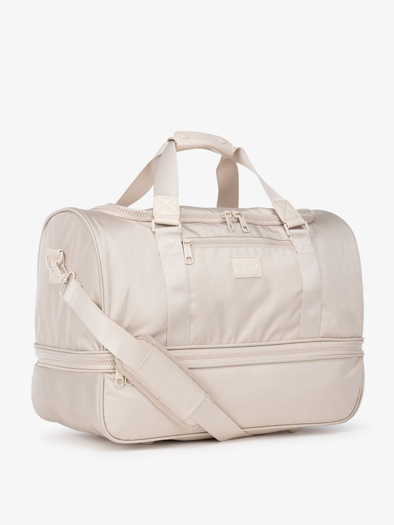 CALPAK Stevyn duffel bag and weekender in cream dune