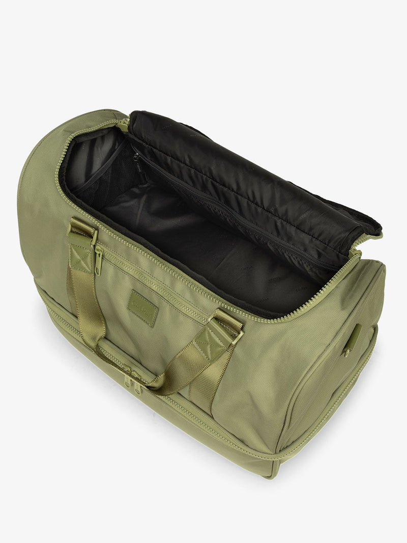 CALPAK Stevyn Duffel with multiple interior pockets in green