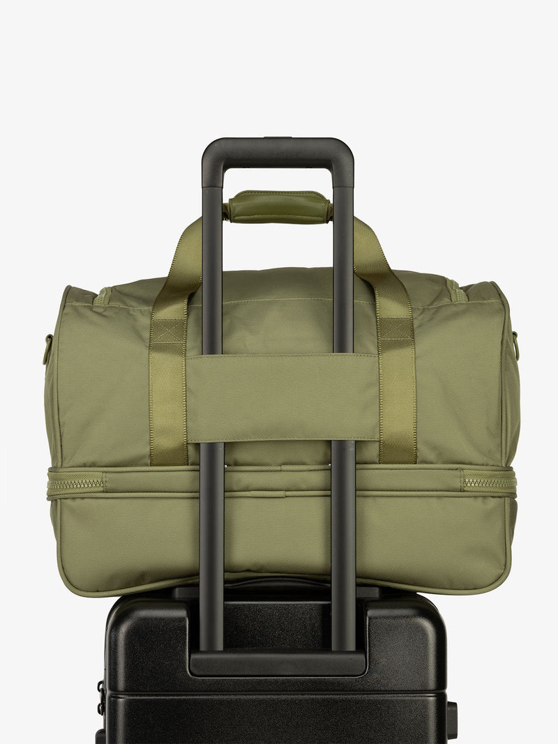 CALPAK Stevyn Duffel with trolley sleeve in pistachio green