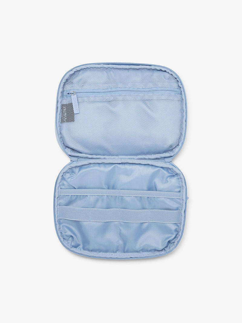 CALPAK tech and electronics organizer for travel in sky blue