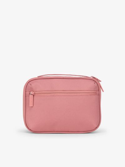 Back-view of CALPAK tech organizer featuring zippered pouch in pink