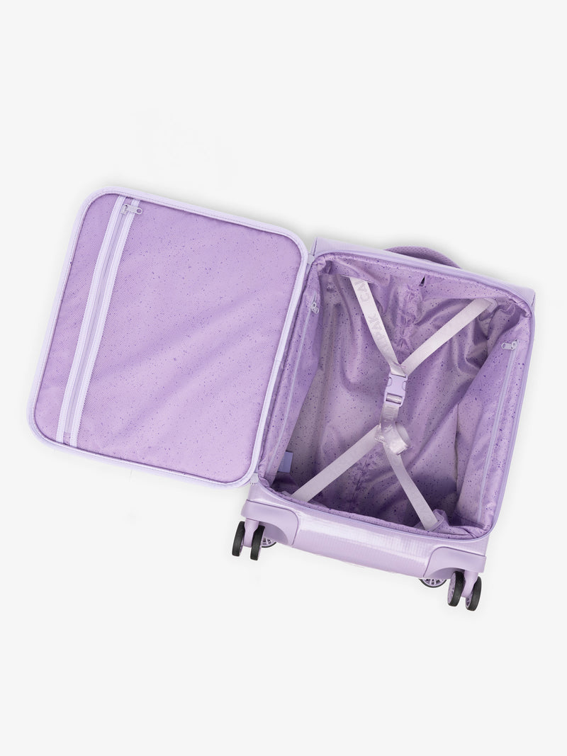 Studio product shot of interior compartment of CALPAK Terra 35L Carry-On luggage with soft shell and 360 spinner wheels in amethyst