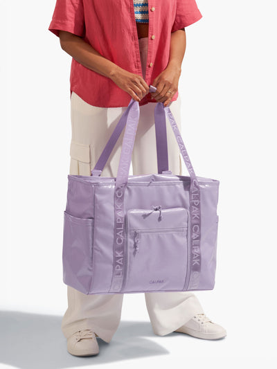 CALPAK Terra 35L Water Resistant Zippered Tote Bag made with durable recycled ripstop exterior, nylon webbing tote straps and multiple exterior pockets in amethyst; TTO2401-AMETHYST view 2