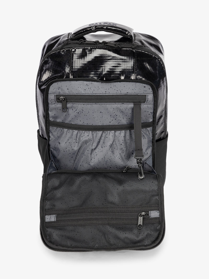 Front pocket interior of CALPAK Terra Hydration Backpack in obsidian