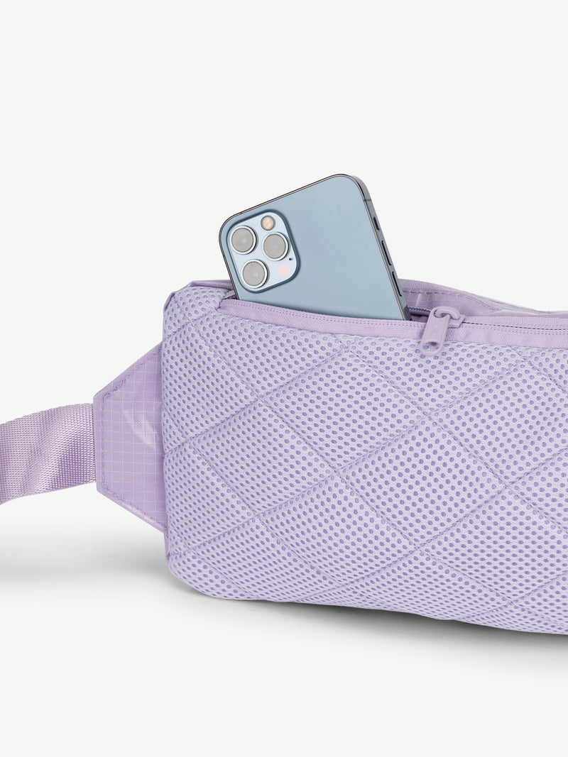 CALPAK crossbody belt bag with padded back and hidden zippered pocket in lavender