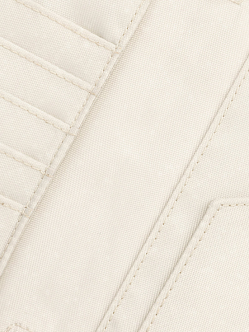 Inner lining of CALPAK Terra Zippered Passport Wallet in beige White Sands