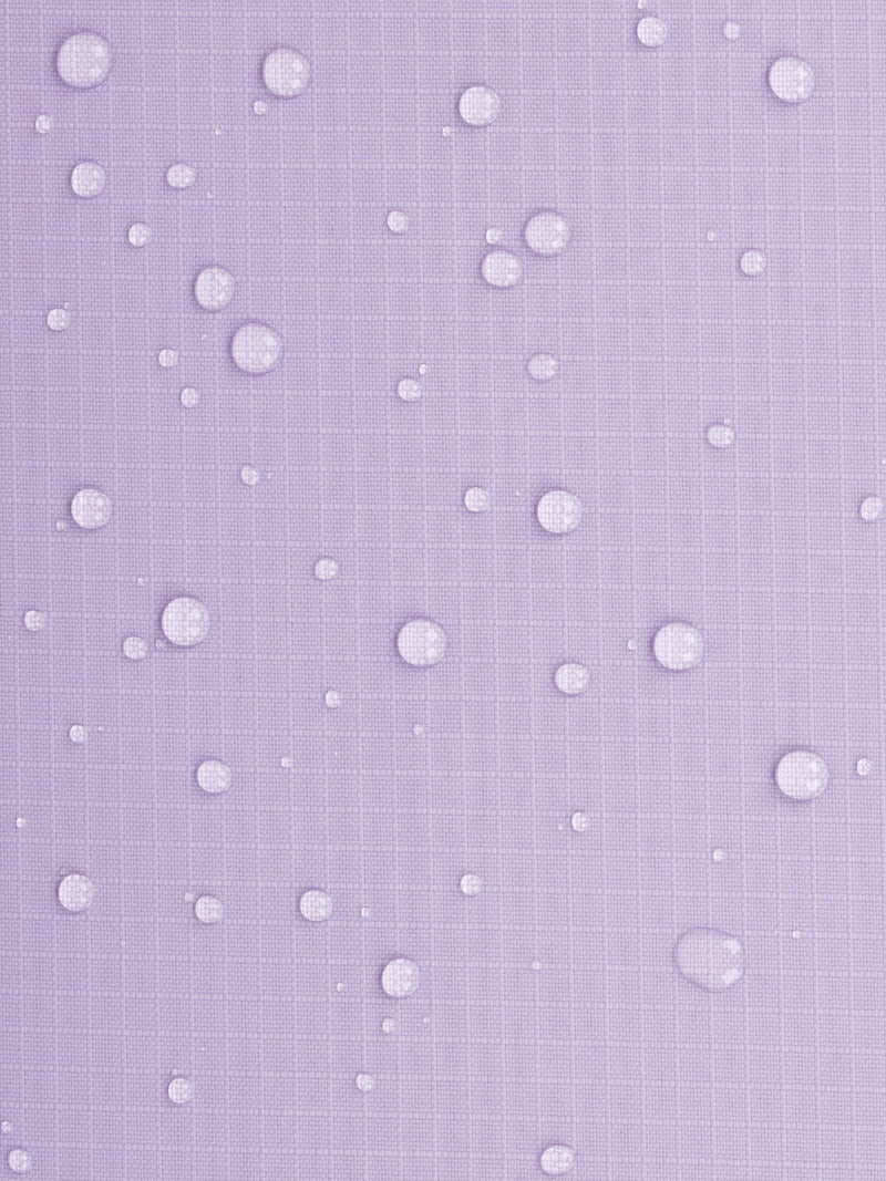 Water resistant material shown with water droplets on CALPAK Terra Zippered Passport Wallet in lavender Amethyst