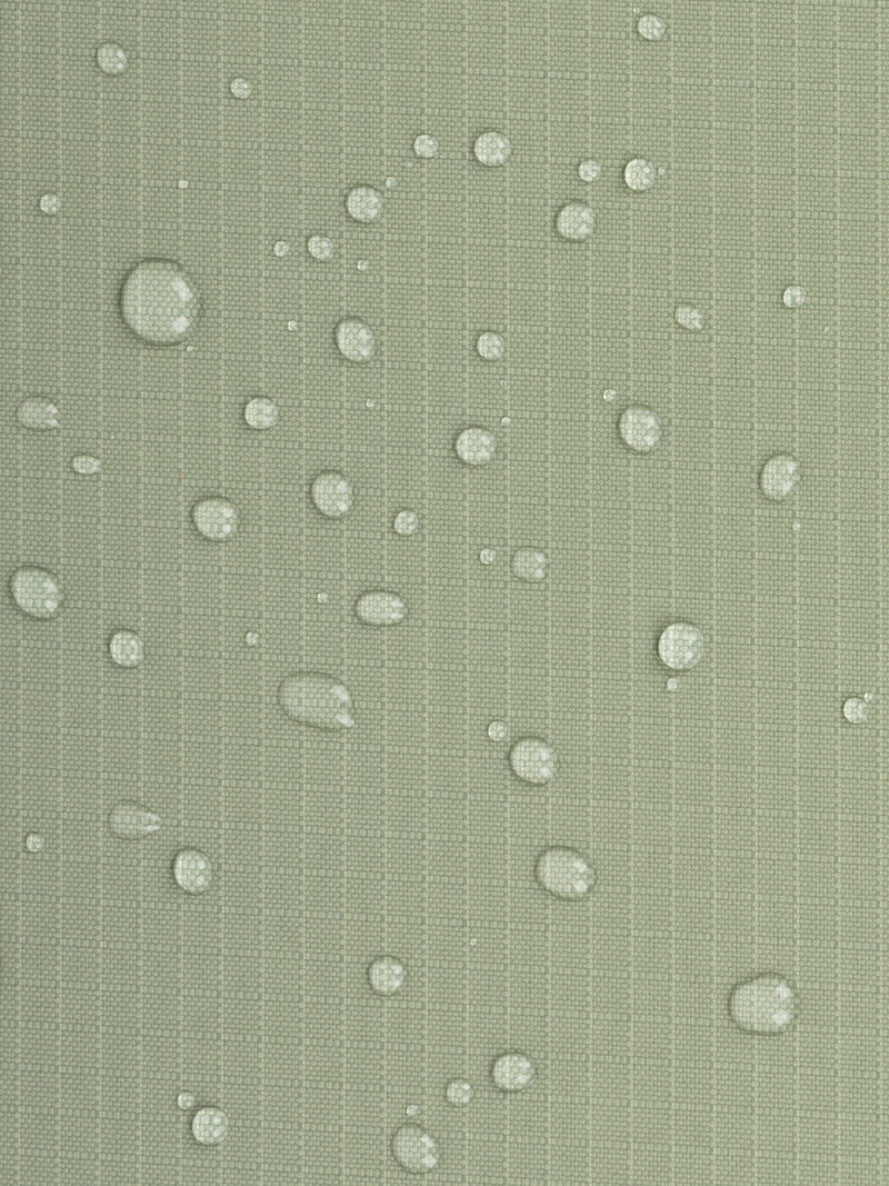 Water resistant material shown with water droplets on CALPAK Terra Zippered Passport Wallet in olive green Juniper