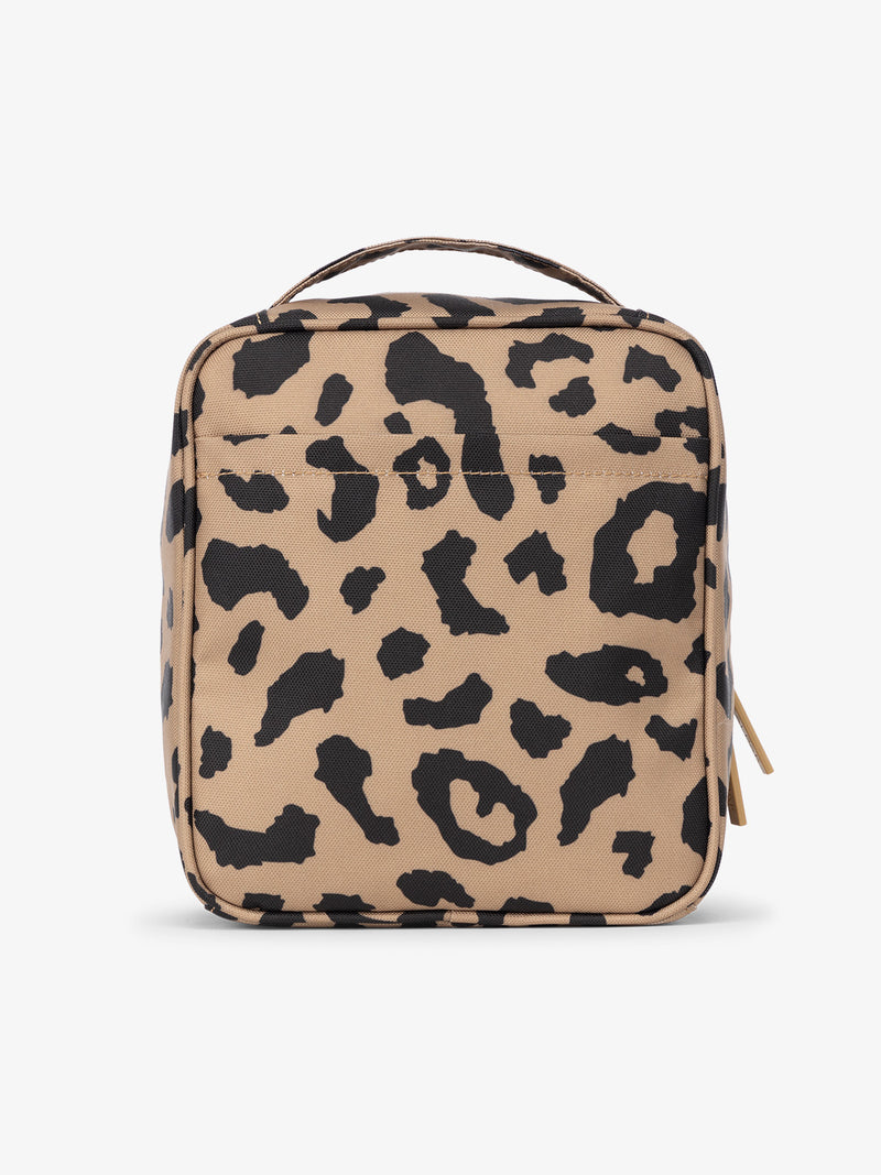 Backview of CALPAK The Everything Cube with exterior back slip pocket in cheetah print