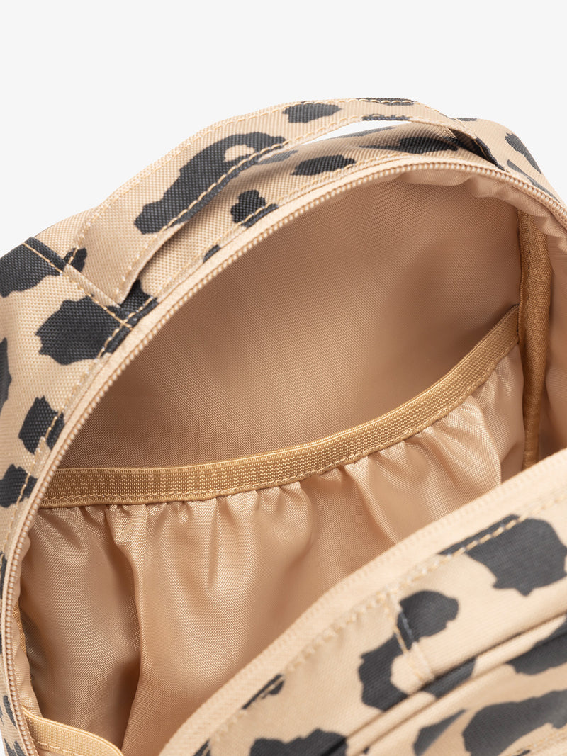 CALPAK The Everything Cube with multiple interior pockets and water resistant lining in cheetah