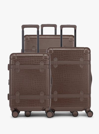 CALPAK TRNK 3 piece luggage set with hard shell exterior and 360 spinner wheels in espresso; LTK3000-ESPRESSO view 1