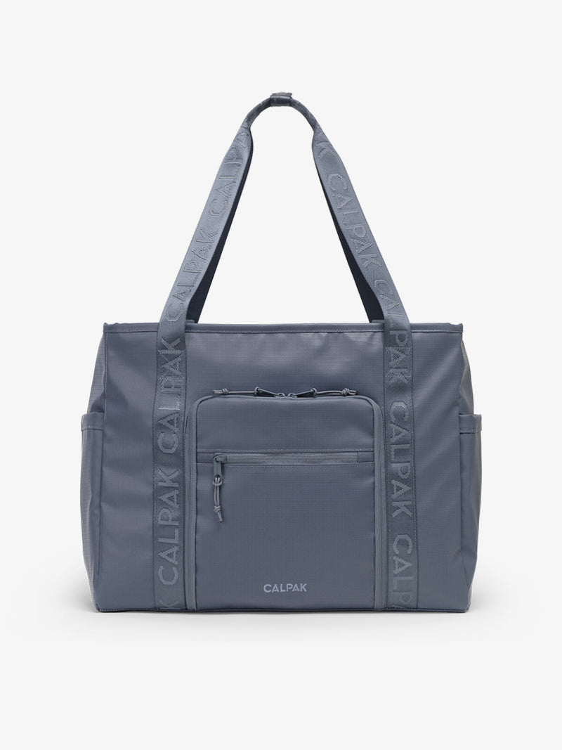 CALPAK Terra 35L Water Resistant Zippered Tote Bag in blue Matte Indigo front view