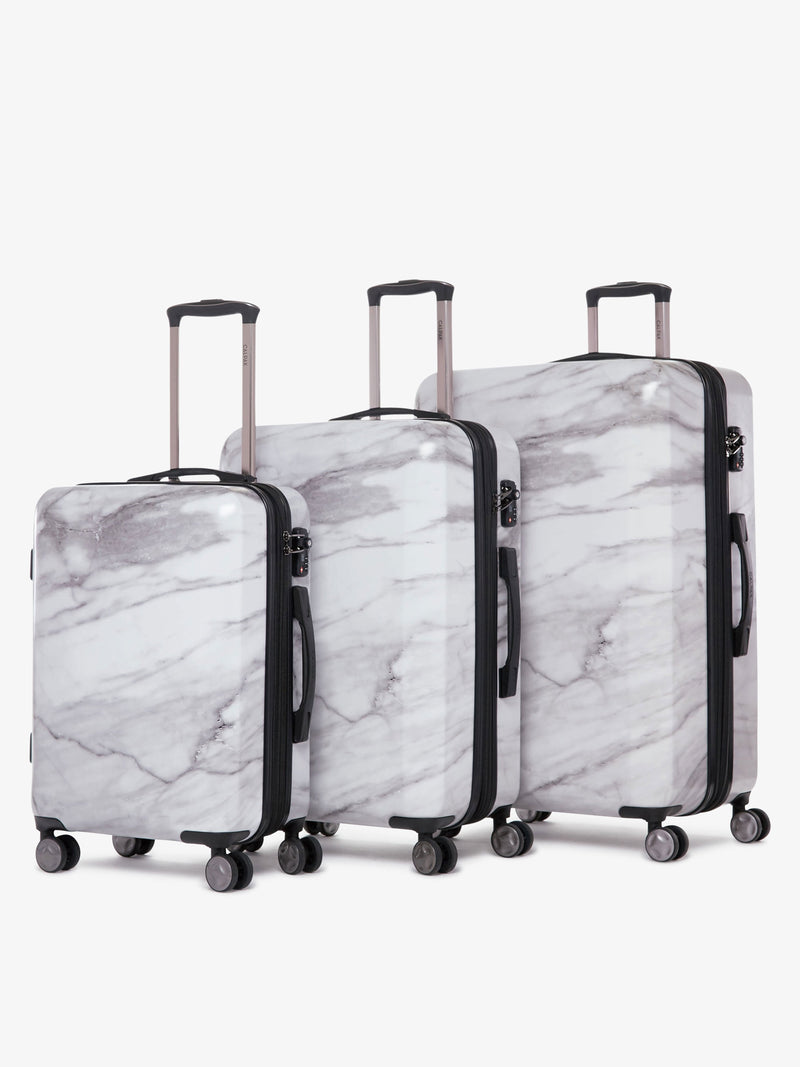 medium white marble hardside spinner luggage as part of CALPAK Astyll collection