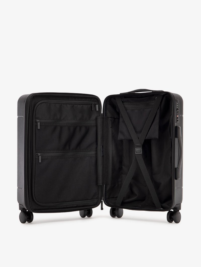 the interior of black CALPAK Hue hard shell carry-on spinner luggage