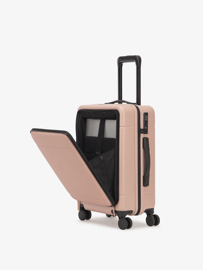 pink CALPAK Hue hard shell carry-on spinner luggage with laptop compartment; LHU1020-PINK-SAND view 1