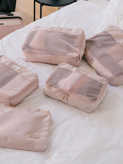 CALPAK 5 piece set packing cubes for travel with labels and top handles in pink grid; PC1601-PINK-GRID view 2