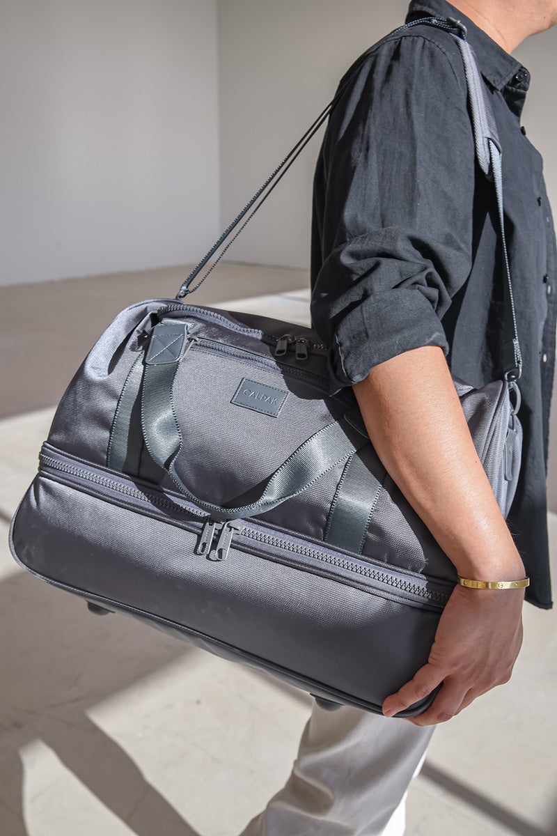 CALPAK Stevyn duffel bag with shoe compartment in slate color