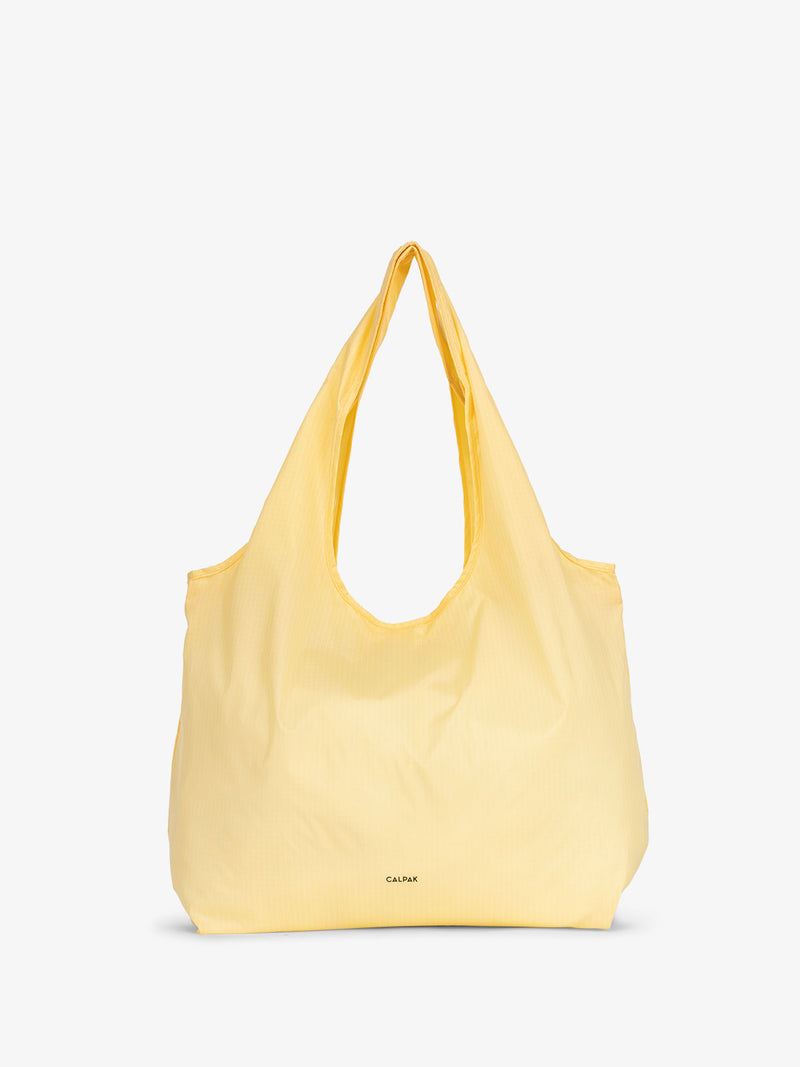 CALPAK yellow foldable grocery tote