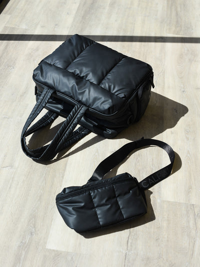 CALPAK Black belt bag and duffel bag