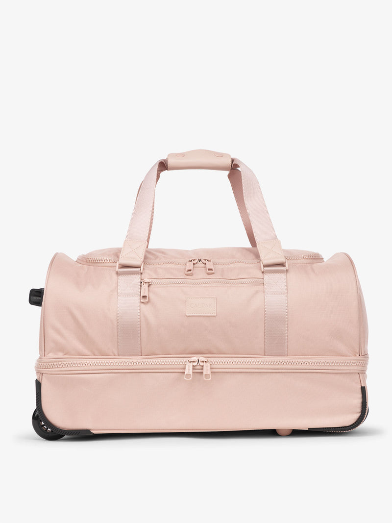 CALPAK Stevyn Rolling Duffel in pink sand